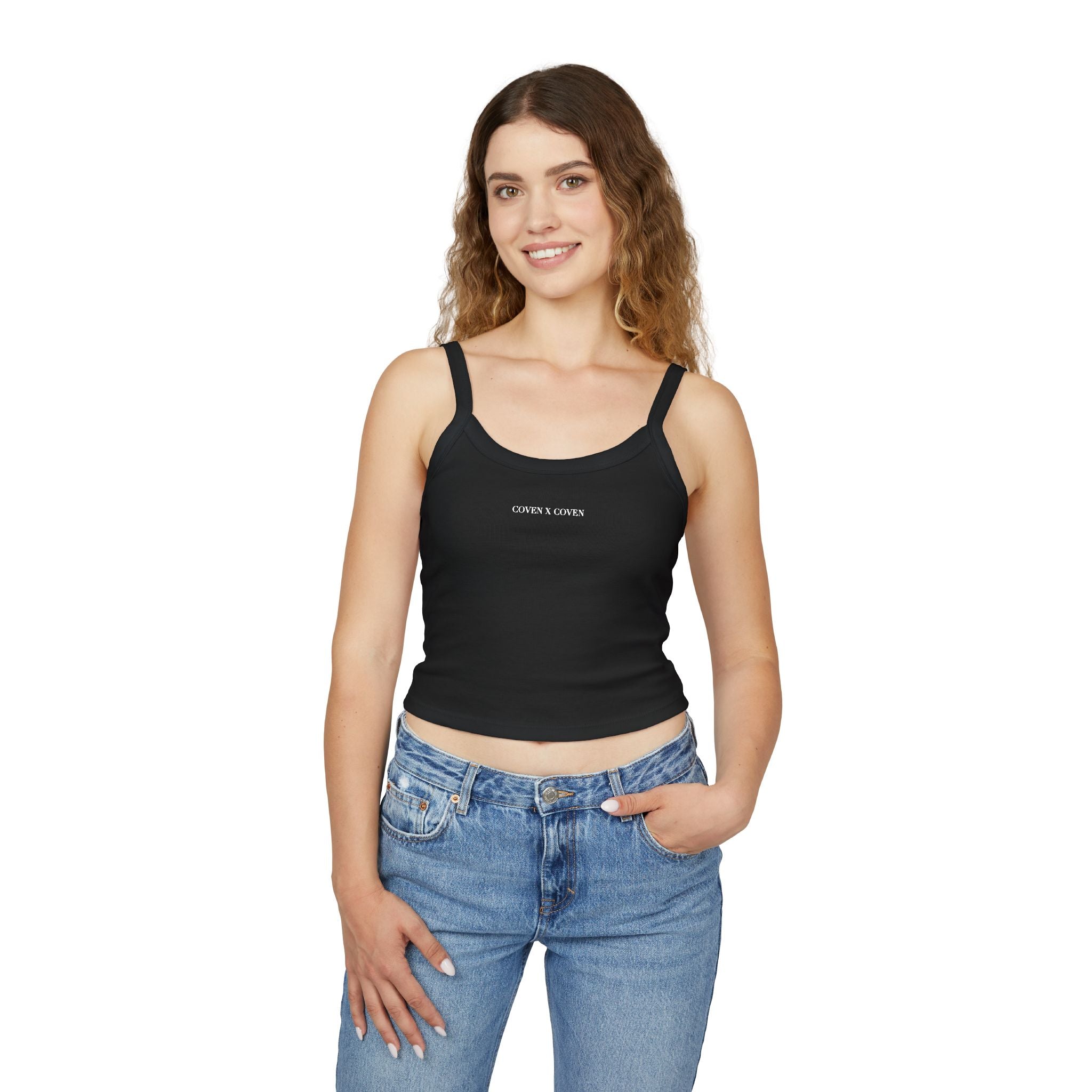 Model wearing Coven x Coven spaghetti strap tank top – black crop top with minimal logo, styled with jeans for gothic streetwear look