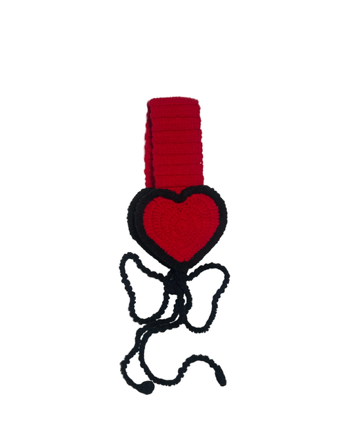 Red heart-shaped bonnet with a black outline on a white background