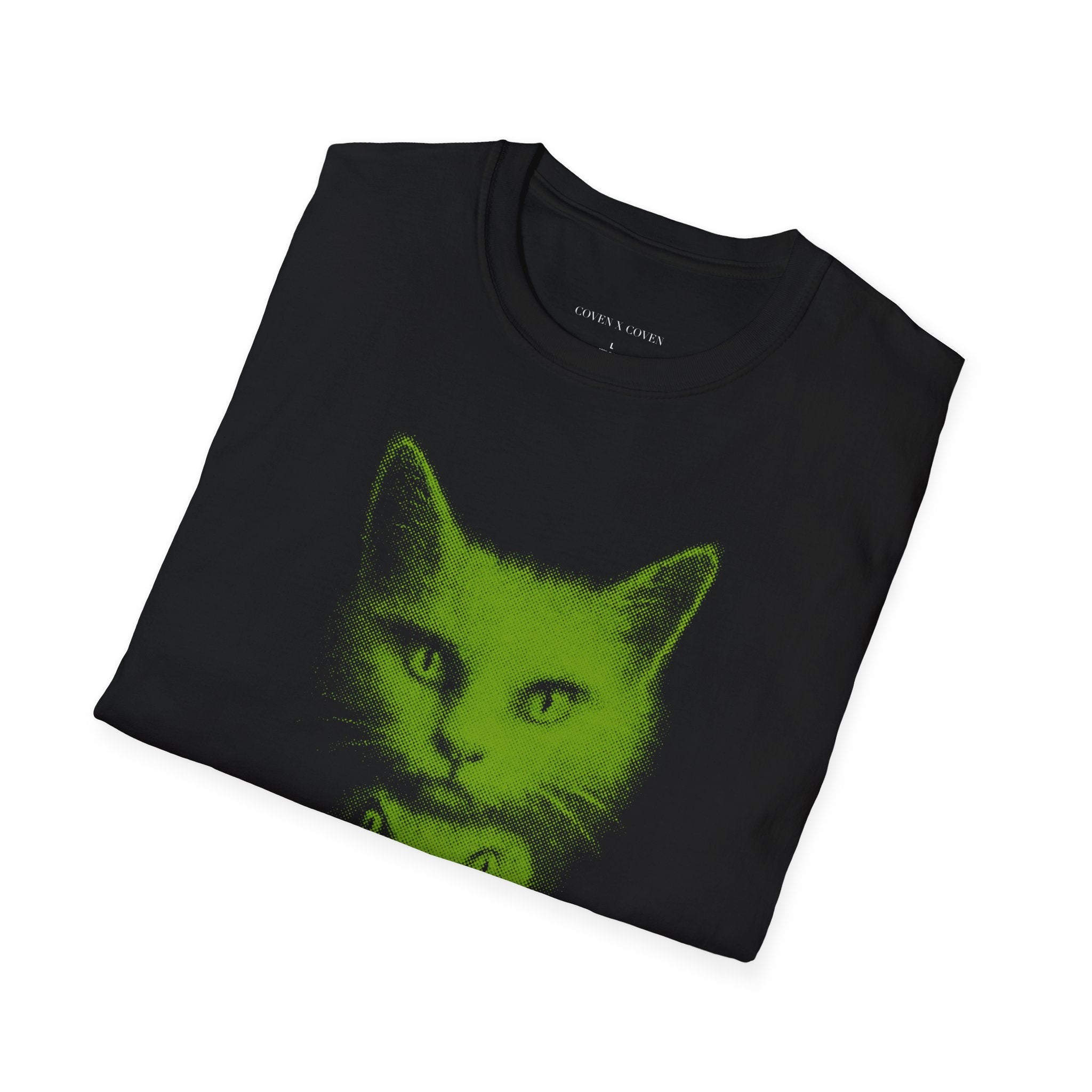 Folded Cat Venom T-shirt – black T-shirt neatly folded showing neon green cat head and snake graphic on front, gothic streetwear style