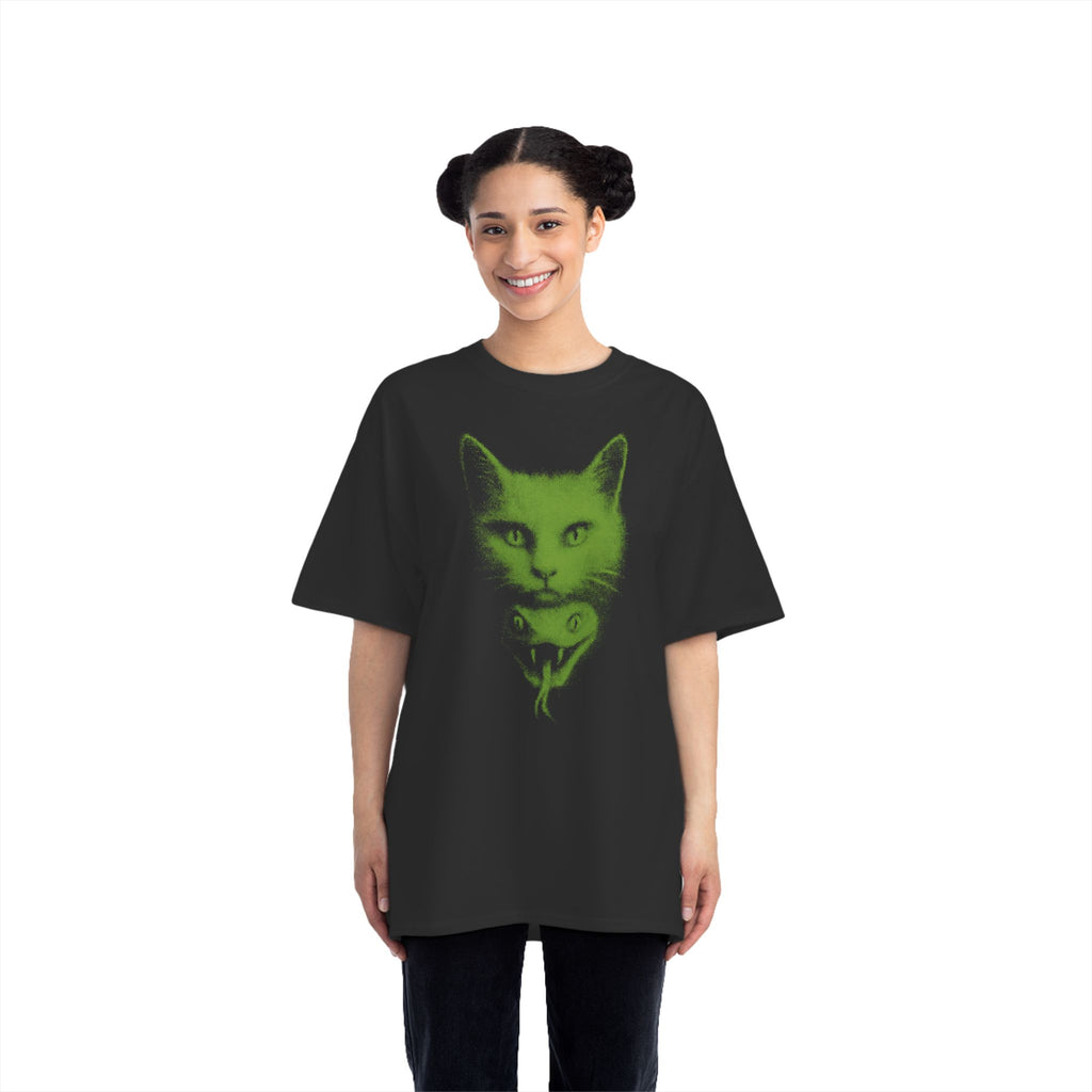 Person wearing Cat Venom box tee – black oversized t-shirt with neon green cat head and snake graphic, styled with dark pants, alternative gothic streetwear