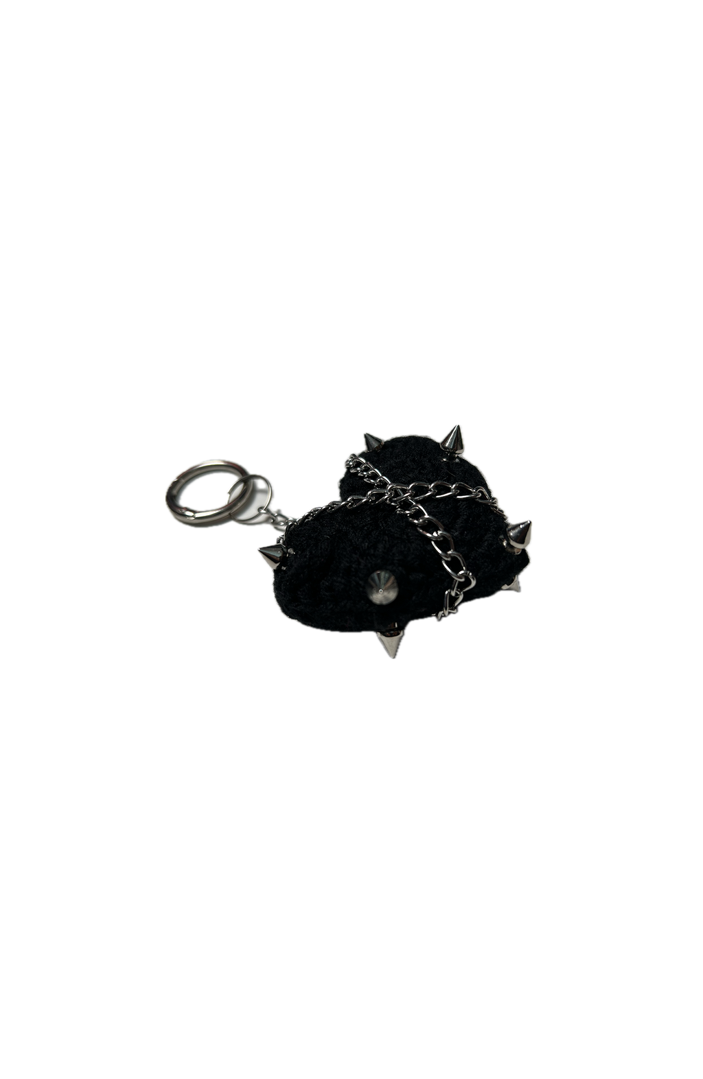 Coven x Coven CUTIES Black Metal Bag Charm on a white background, showing the plush black heart with metal spikes, chain detail, and keyring.”